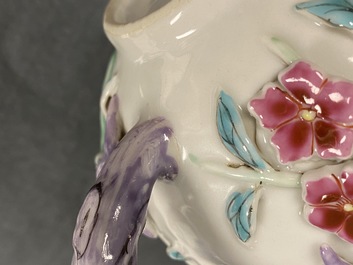 A pair of Chinese famille rose relief-decorated teapots with floral design, Yongzheng